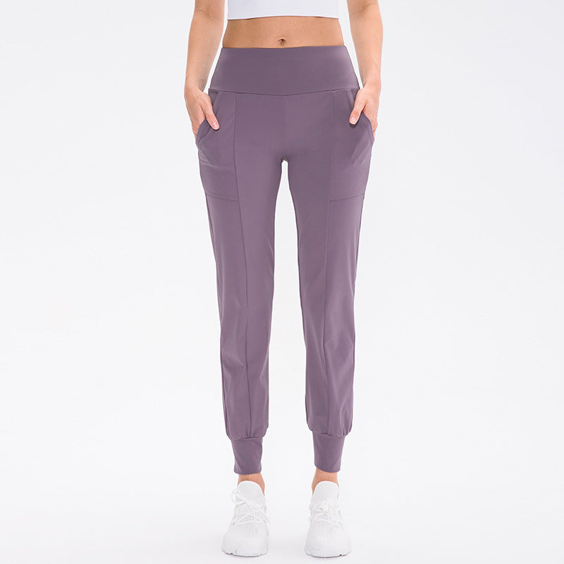 Damen elastische Sporthose mit praktischen Seitentaschen und temperaturregulierendem Material Drune