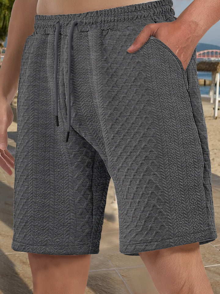 Herren nan strukturierte Strand-Bermuda aus Waffeljersey mit elastischem Kordelbund und schrägen Eingrifftaschen Drune