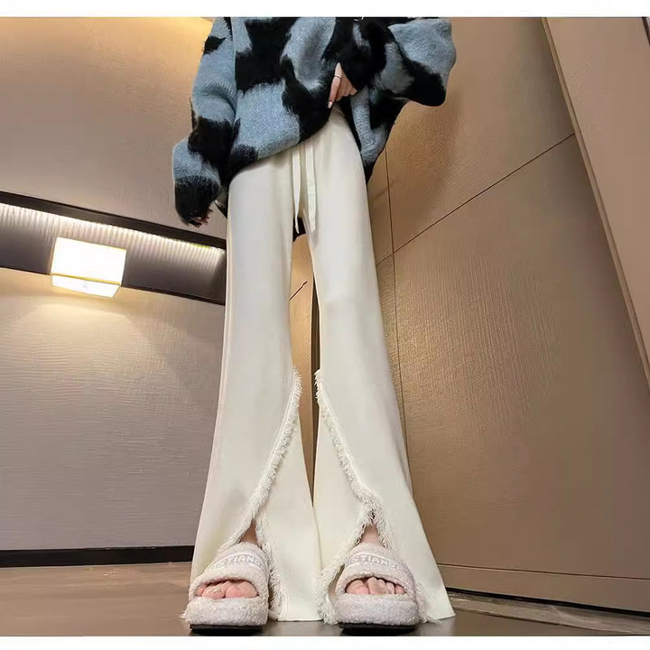 Damen Elegante Hose mit hohen Seitenschlitzen und fransigen Abschlüssen Drune