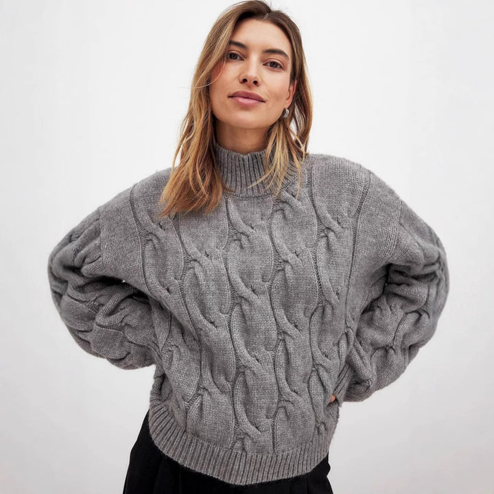 Damen kuscheliger Grobstrickpullover mit hohem Kragen und Zopfdesign Drune