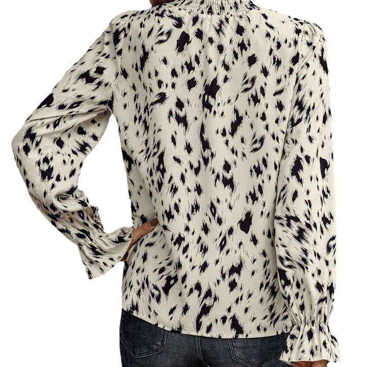 Damen Bluse mit asymmetrischem Saum und elegantem Print Drune