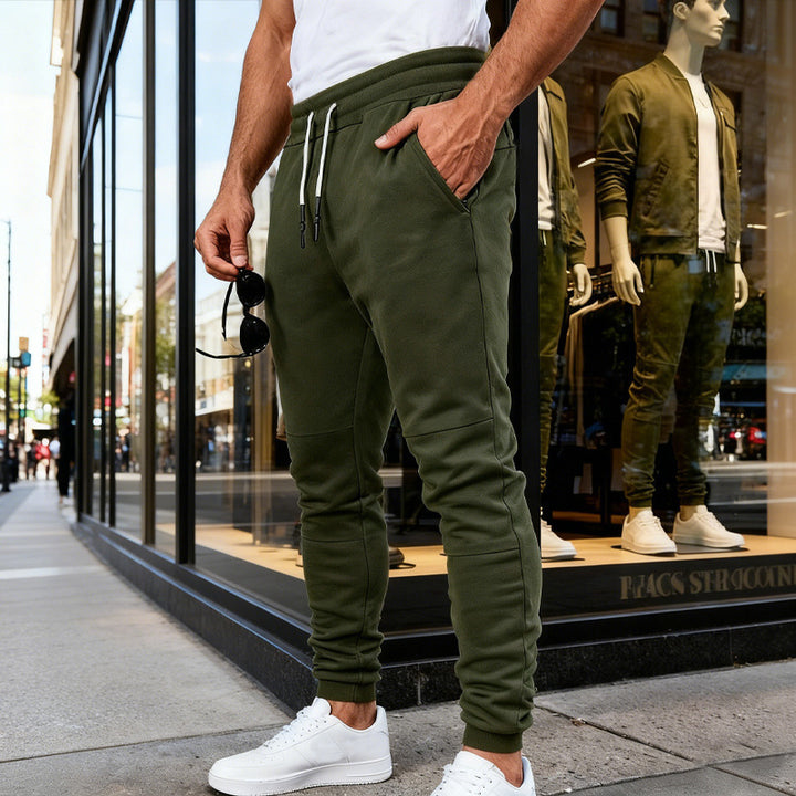 Herren nan tapered Jogginghose mit Kniepasse, elastischem Tunnelzugbund und Reißverschlusstaschen Drune