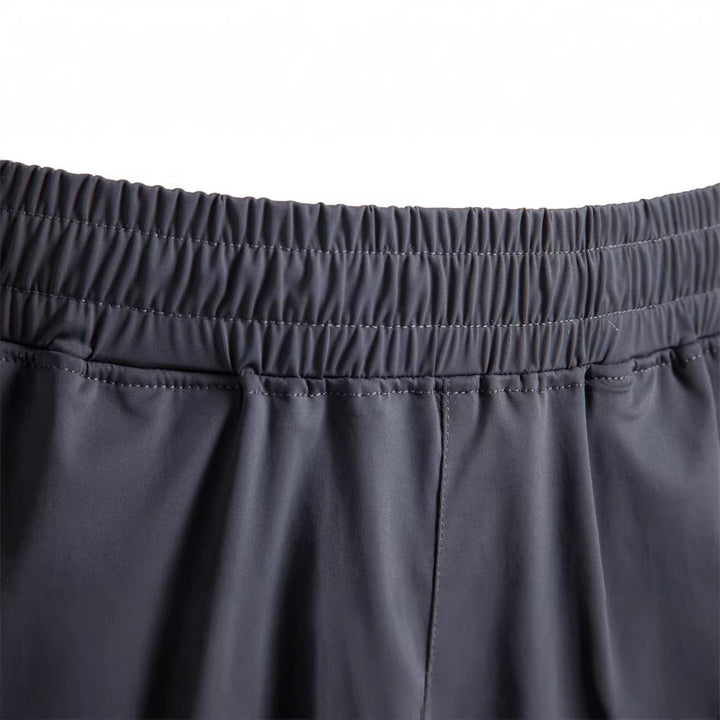 Herren nan atmungsaktive Trainingsshorts mit elastischem Bund und Seitentaschen Drune