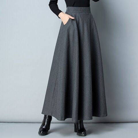 Damen Eleganter Maxirock mit schwingendem Saum und praktischen Taschen Drune