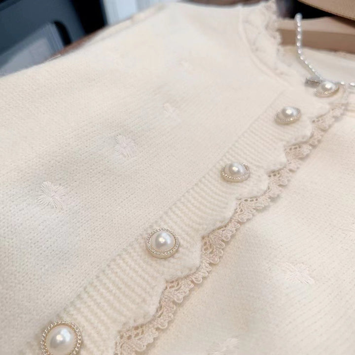 Damen Strickjacke mit dekorativen Perlenknöpfen und zarter Rippstruktur Drune