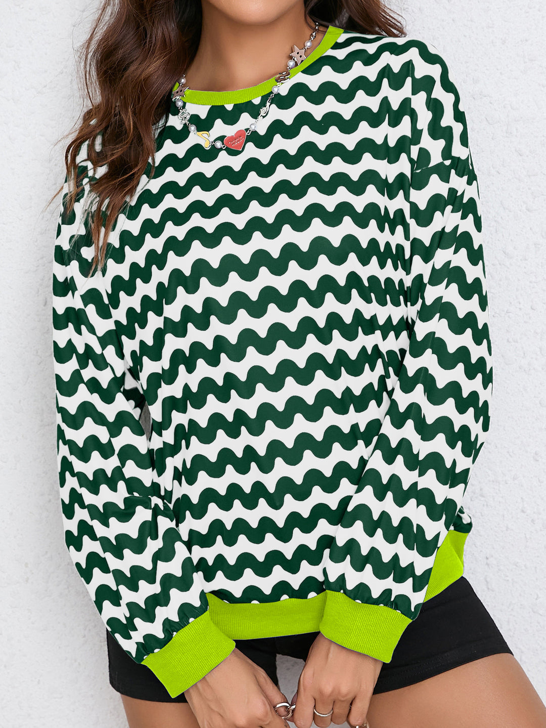 Damen farbenfrohes Sweatshirt mit Wellenmuster und sportlichem Schnitt Drune