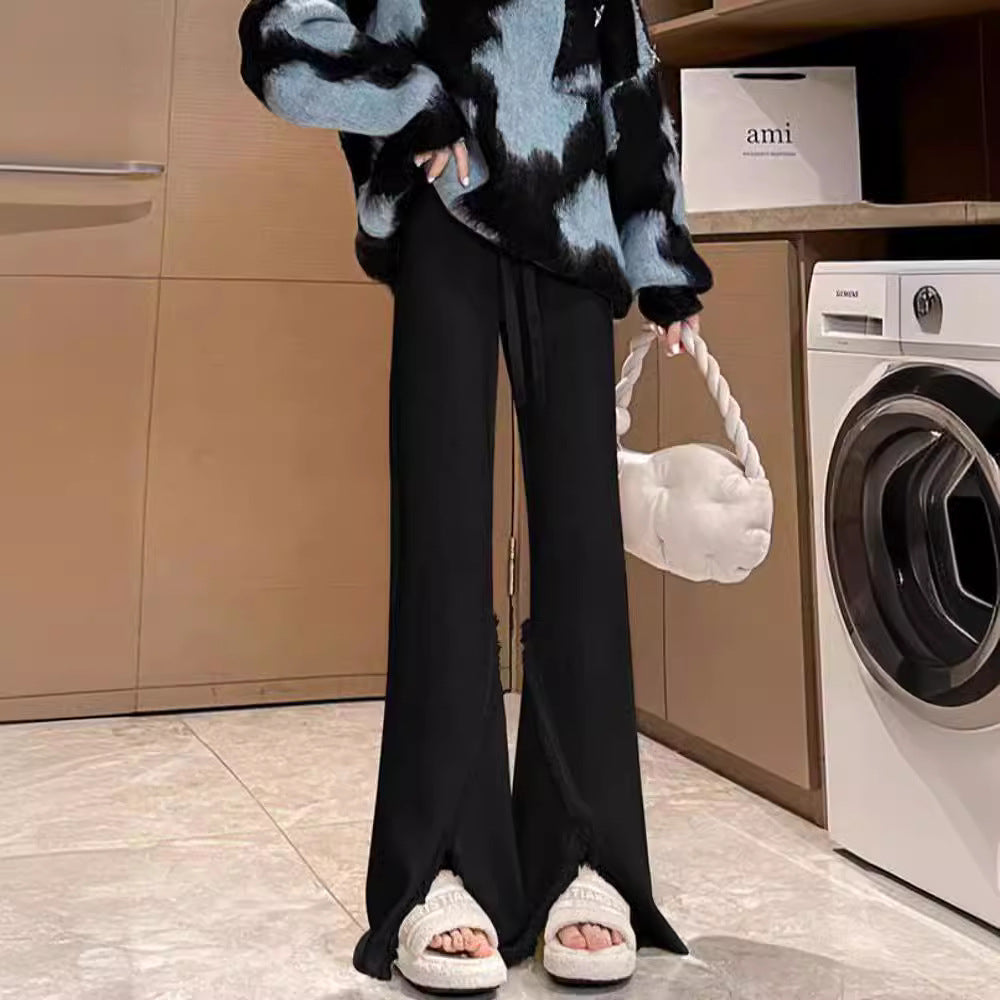 Damen Elegante Hose mit hohen Seitenschlitzen und fransigen Abschlüssen Drune