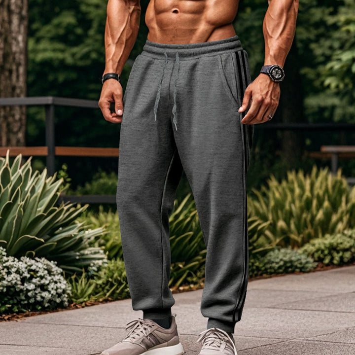 Herren Bequeme Sporthose mit kontrastierenden Seiteneinsätzen und elastischem Bund Drune