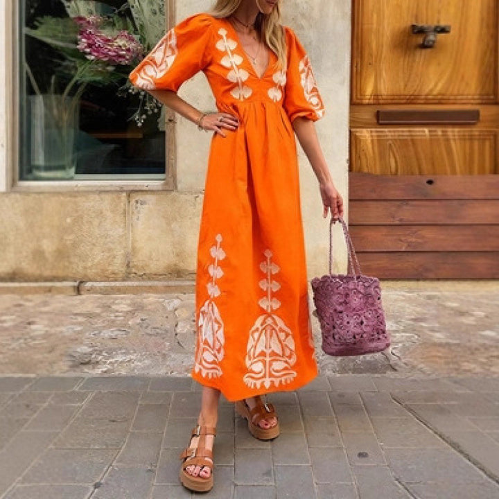 Damen Midikleid mit luftigen Puffärmeln und floralem Stickdesign Drune