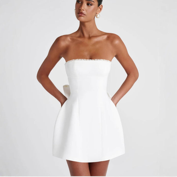 Damen Cocktailkleid mit schulterfreiem Design und perlenverziertem Saum Drune