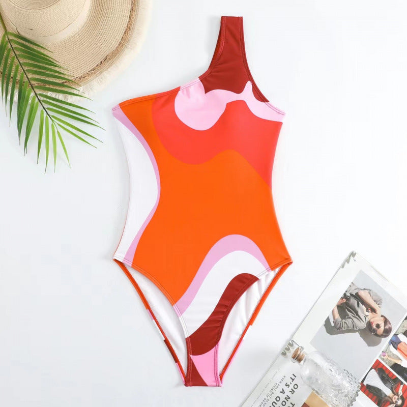 Damen Einteiler Badeanzug mit modischem Muster und passendem Sarong Drune