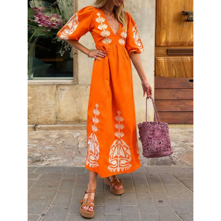 Damen Midikleid mit luftigen Puffärmeln und floralem Stickdesign Drune