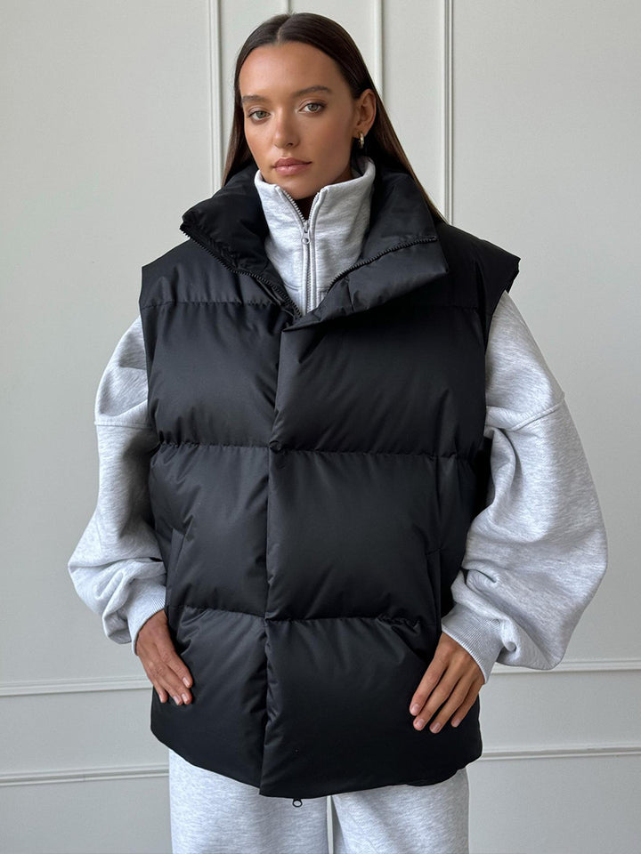 Damen Steppweste mit hohem Kragen und praktischen Taschen Drune