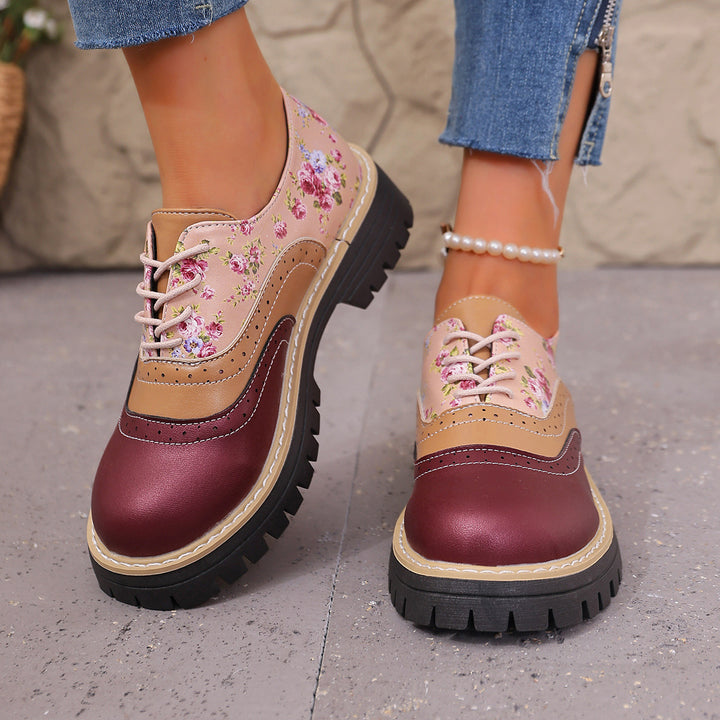Damen Budapester-Schnürschuh mit floralem Print Lacklederbesatz und grober Profilsohle Drune