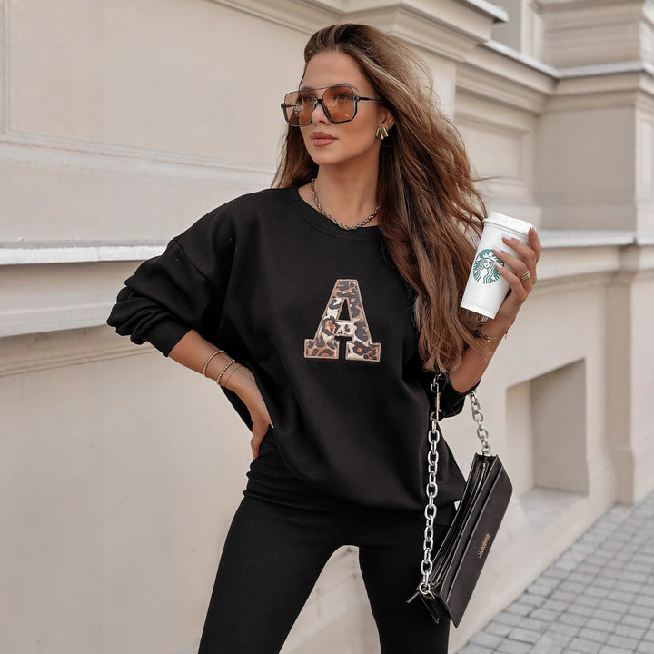Damen lässiges Sweatshirt mit großem Initial und entspannter Passform Drune