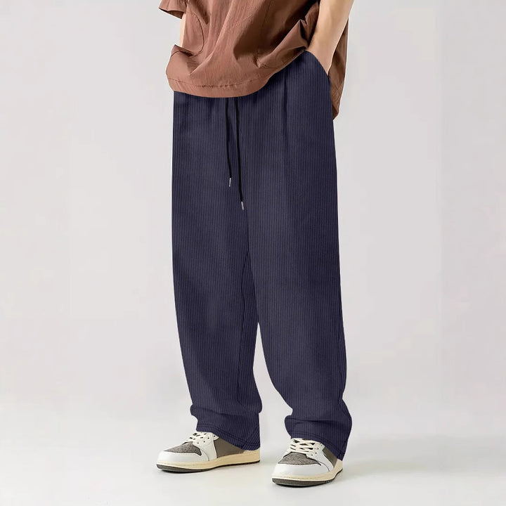 Herren nan weite Relax-Freizeithose aus geripptem Jersey mit Kordelzug, Seitentaschen und weitem Bein Drune