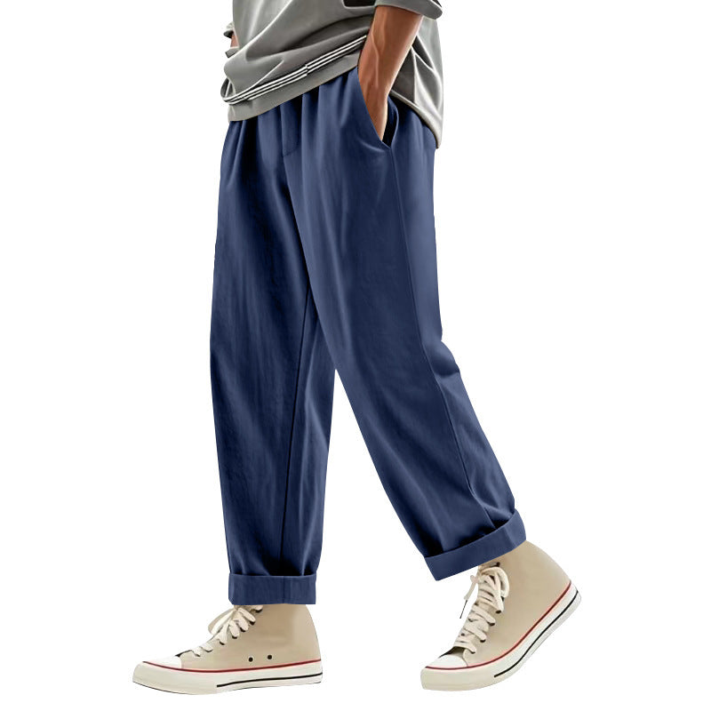 Herren nan weite Bundfalten-Chinohose mit Umschlag, konisch zulaufendem Schnitt und seitlichen Eingrifftaschen Drune