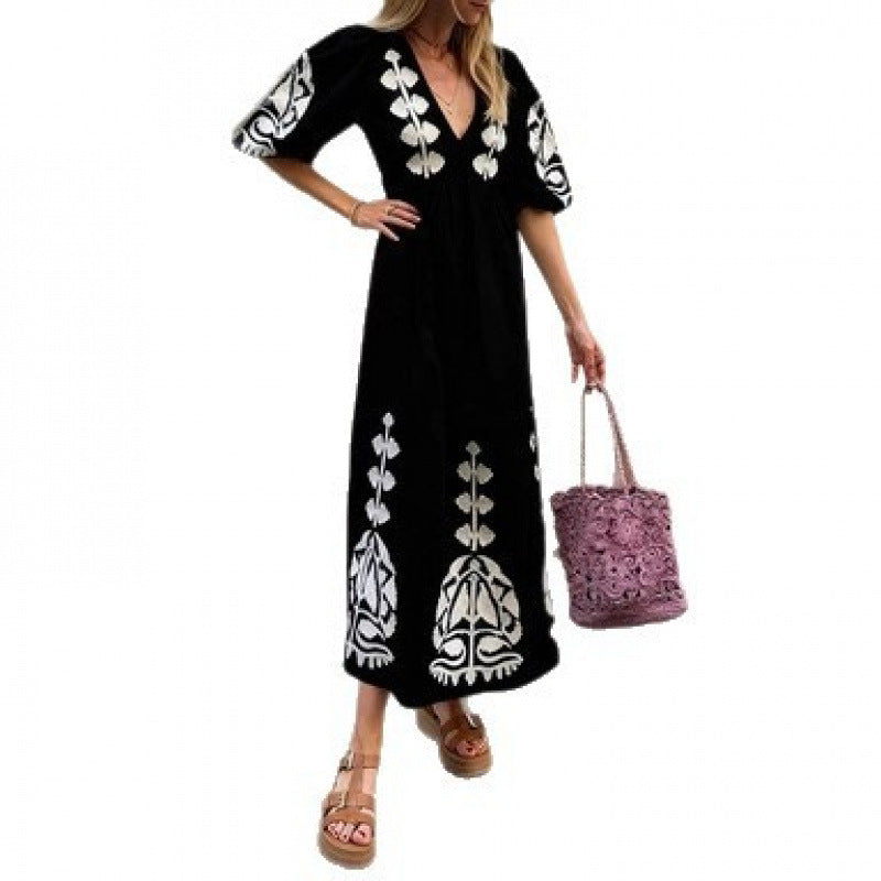 Damen Midikleid mit luftigen Puffärmeln und floralem Stickdesign Drune