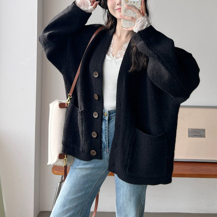 Damen Grobstrickjacke mit eleganten Knopfdetails und praktischen Taschen Drune