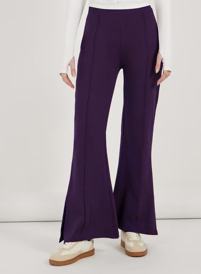 Damen weite Flared-Hose aus strukturiertem Material mit seitlichen Schlitzen Drune