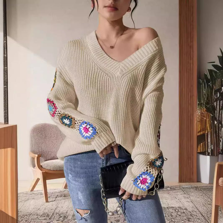 Damen modischer Strickpullover mit einzigartiger Schnittführung und kreativen Häkelmotiven Drune