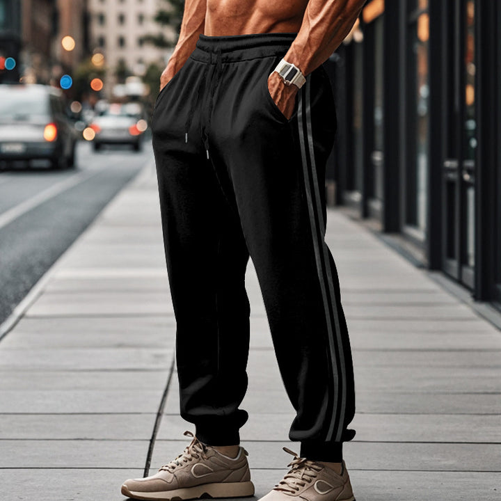 Herren nan sportliche Jogginghose mit seitlichen Kontraststreifen, elastischem Tunnelzugbund und gerippten Beinabschlüssen Drune