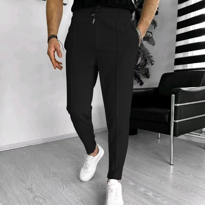 Herren nan schmal zulaufende Jogging-Chino aus strukturierter Webqualität mit elastischem Tunnelzugbund und dekorativer Bügelfalte Drune