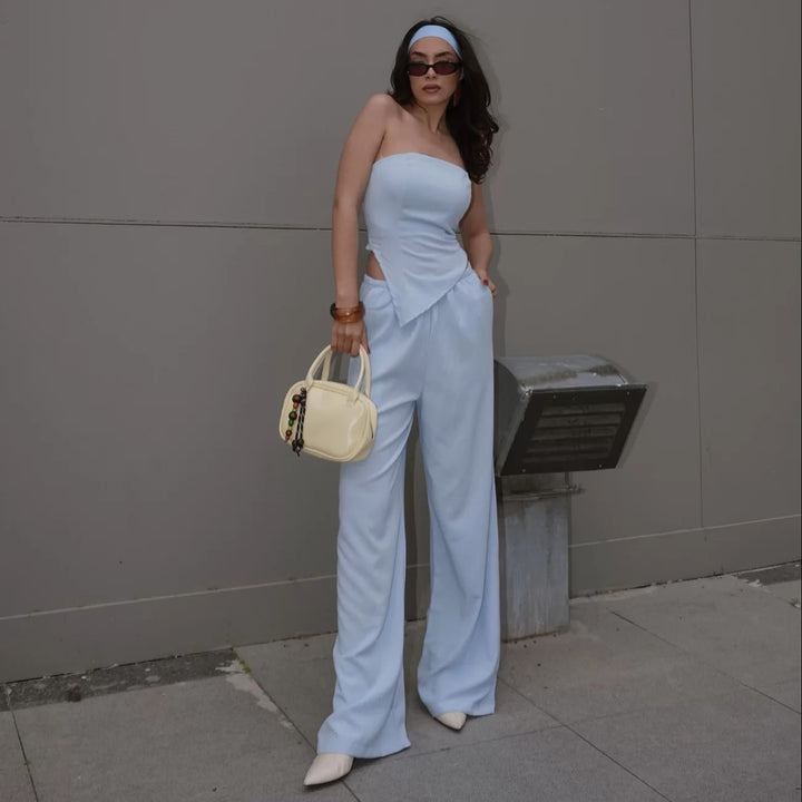 Damen eleganter Jumpsuit mit Schulterfreier Schnittführung und fließendem Material Drune