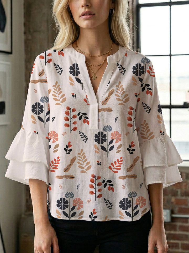 Damen Bluse mit voluminösen Rüschenärmeln und modernem Motiv Drune