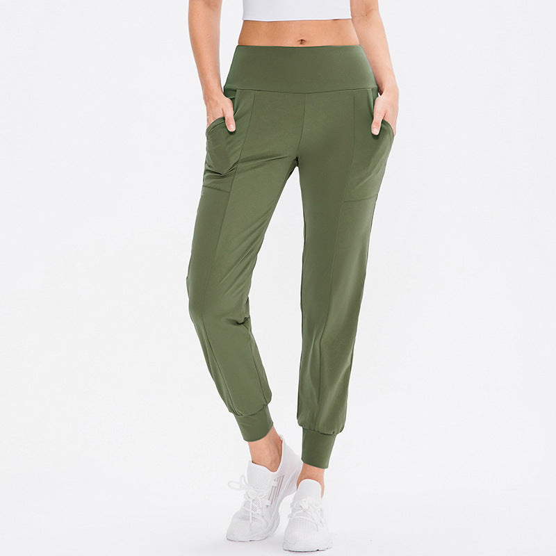Damen elastische Sporthose mit praktischen Seitentaschen und temperaturregulierendem Material Drune