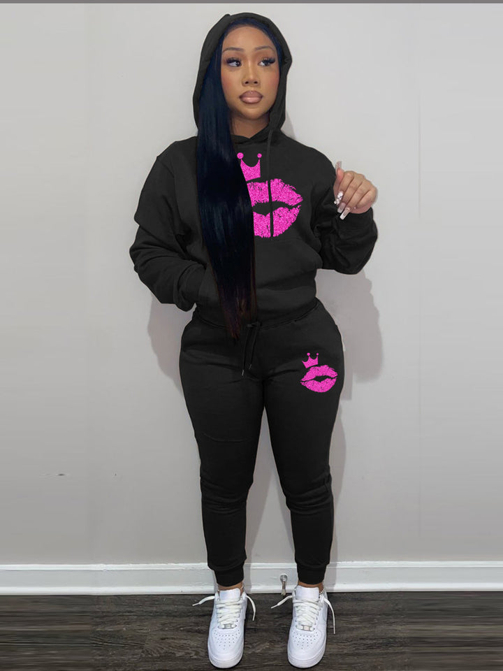 Damen Kapuzen-Pullover und Jogginghose Set mit auffälligem Lippenmotiv und Krönchen Drune
