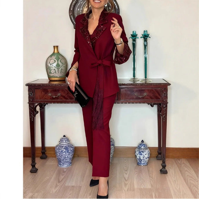 Damen Eleganter Gürtelanzug mit schimmerndem Revers Drune