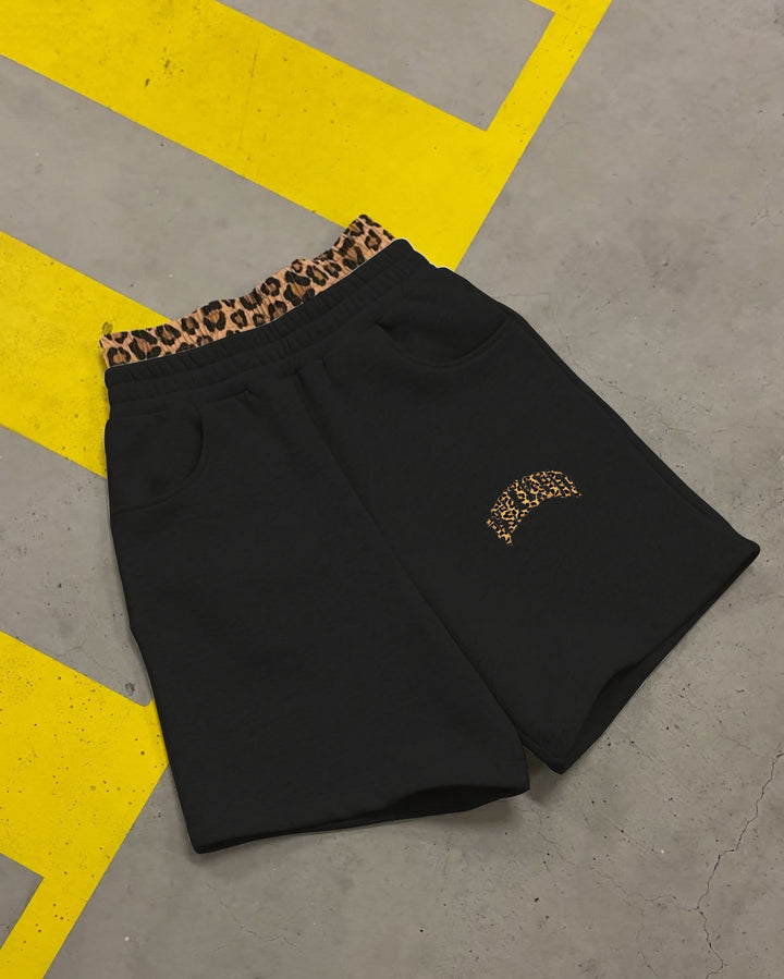Damen nan hochgeschnittene Jogginghose mit ausgestelltem Bein, elastischem Rüschbund und Leo-Stickdetail Drune