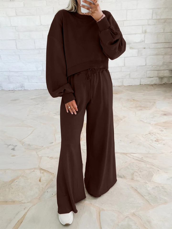 Damen gemütliches Sport-Set mit lässigem cropped Sweatshirt und weitem Hosen Schnitt Drune