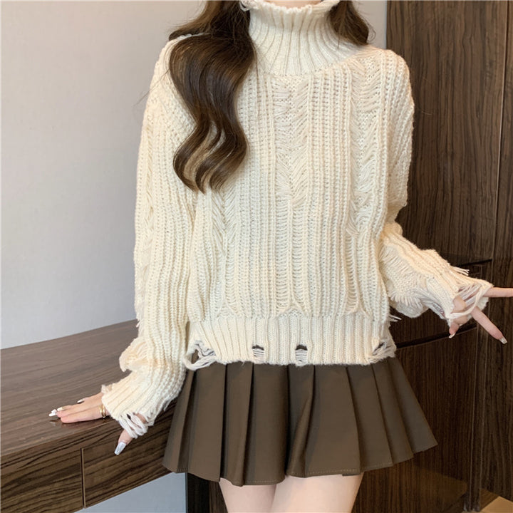 Damen Grobstrickpullover mit hohem Kragen und fransigen Designelementen Drune