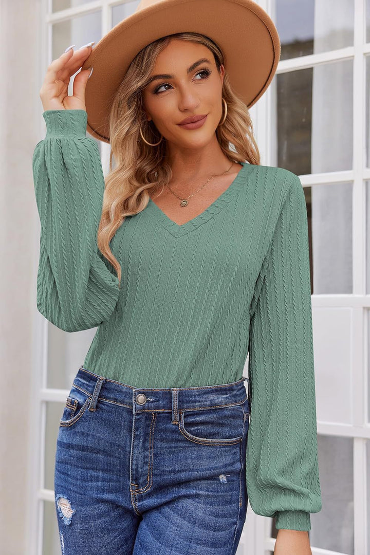 Damen Strickbluse mit feiner Rippstruktur und lässigem V-Ausschnitt Drune