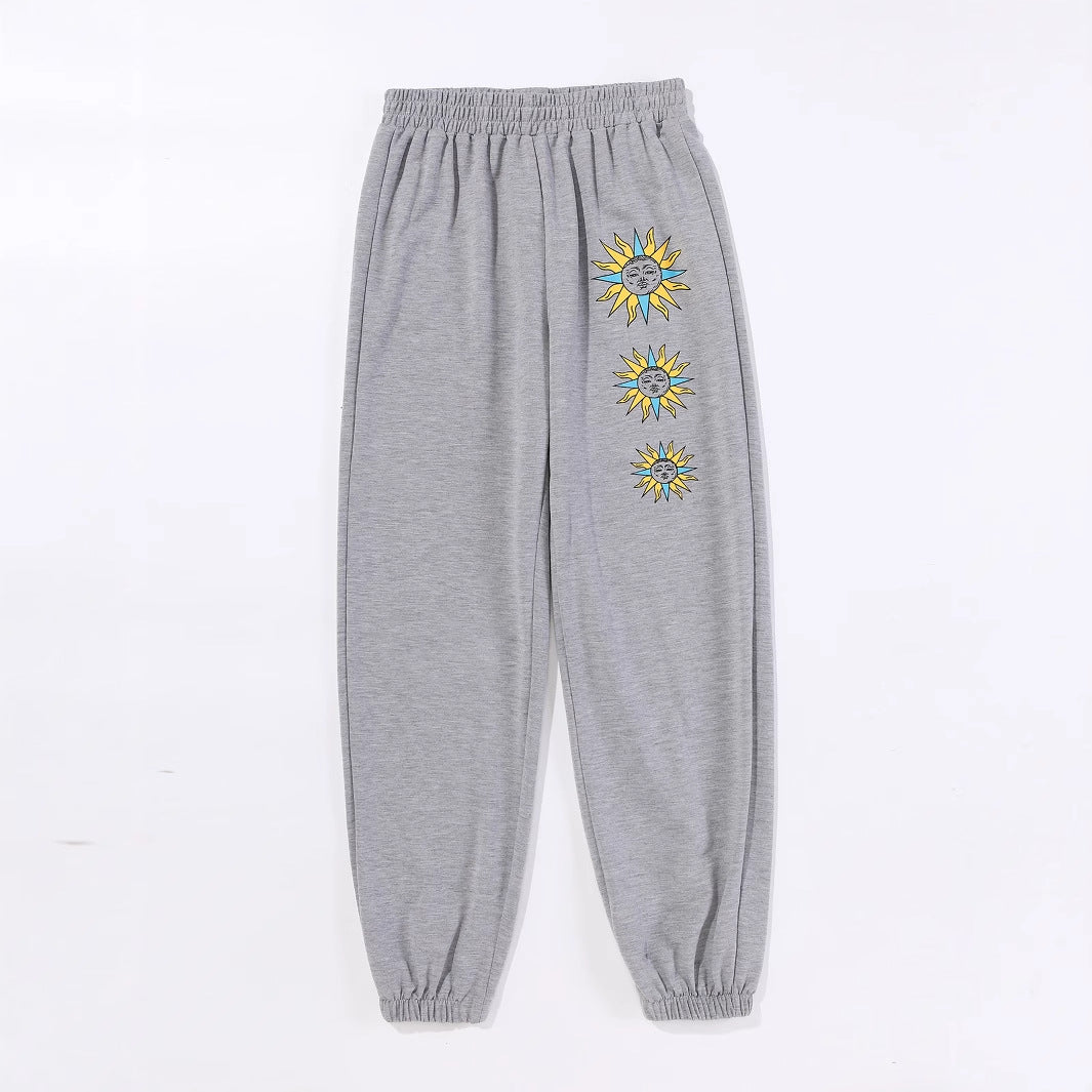 Damen bequeme Sweatpants mit trendigem Sonnenmotiv Drune