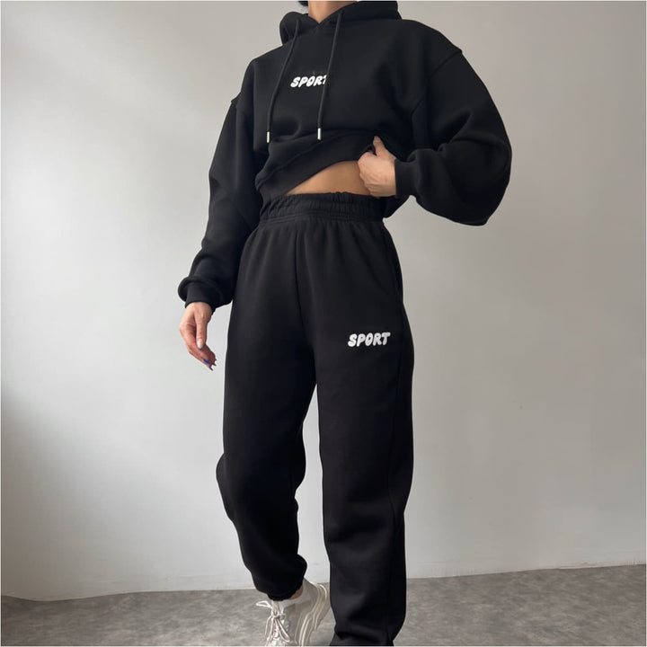 Damen modisches sportliches Set mit cropped Hoodie und weiten Jogginghosen Drune