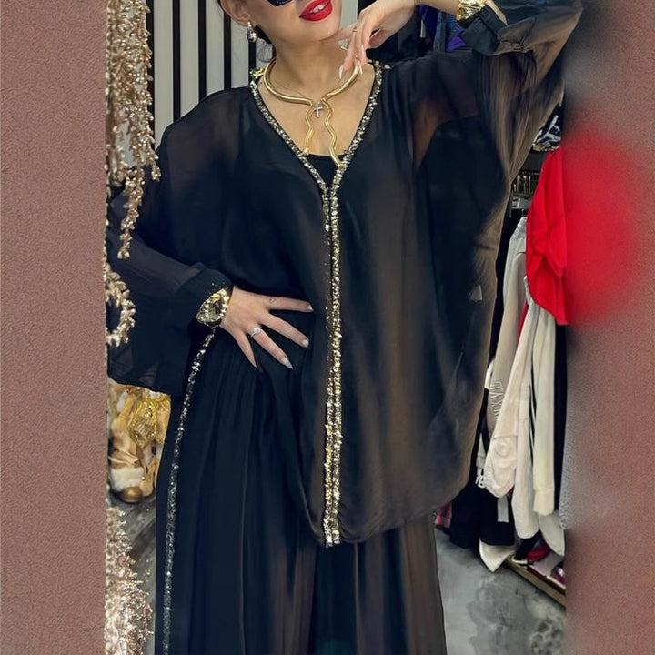 Damen luftiges Jumpsuit mit elegantem Overlay und glitzernden Details Drune