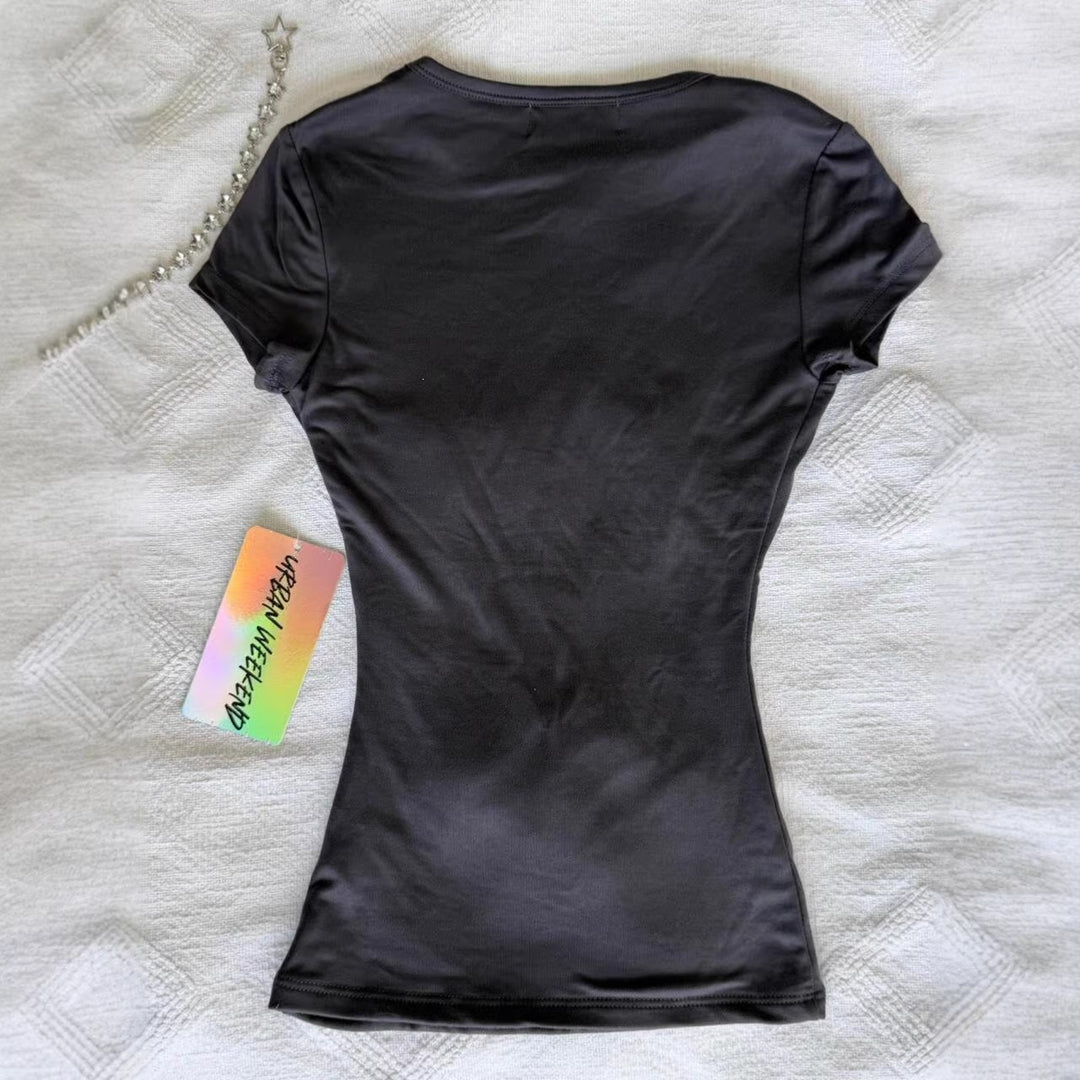 Damen T-Shirt mit funkelndem Grafikkreuz und floralem Design Drune