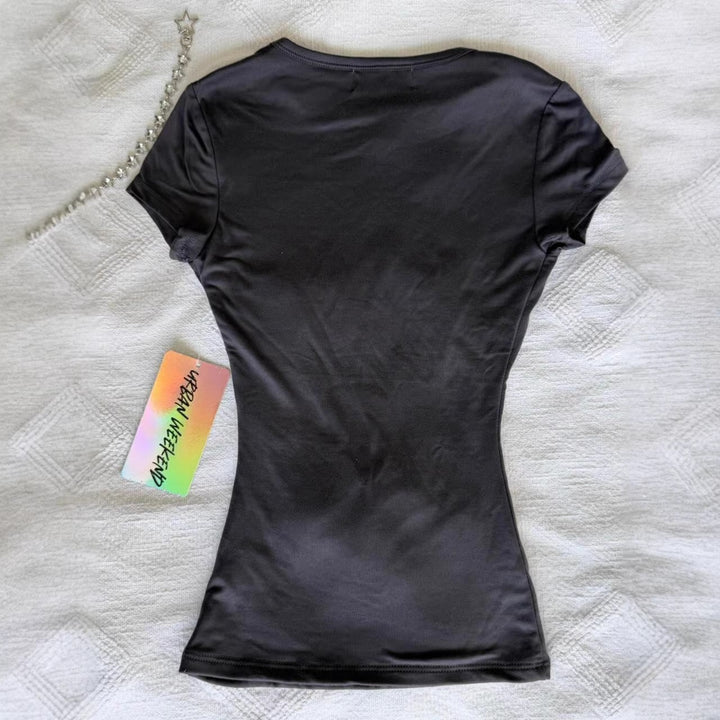 Damen T-Shirt mit funkelndem Grafikkreuz und floralem Design Drune
