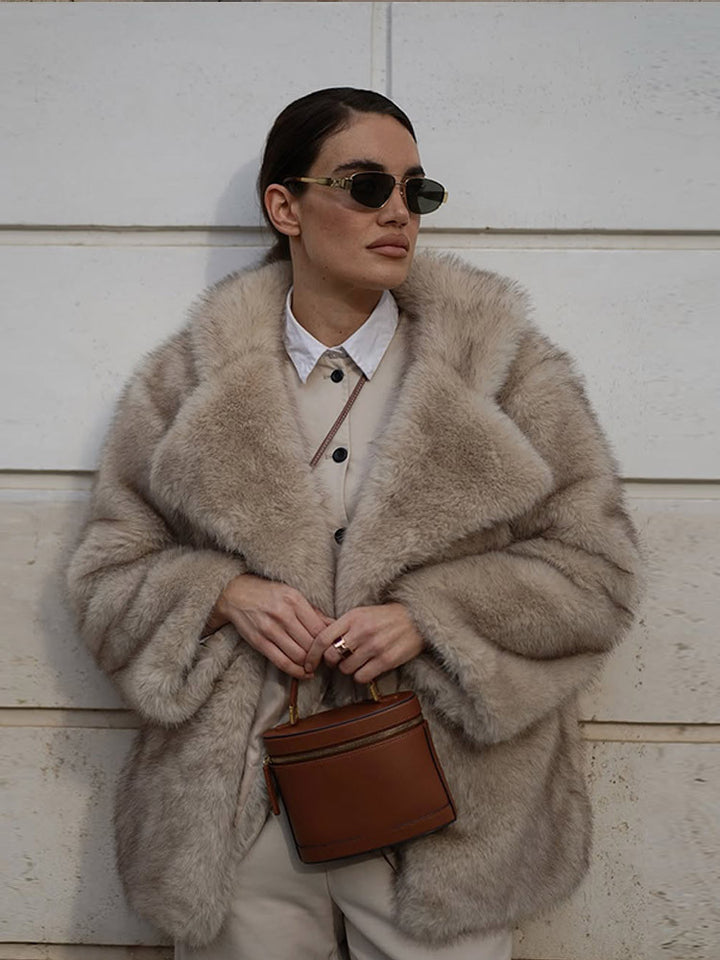 Damen Kunstfelljacke mit voluminösen Ärmeln und luxuriösem Design Drune