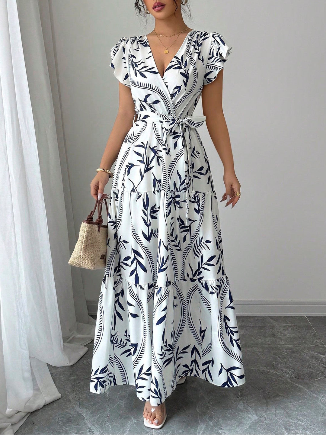 Damen Maxikleid im boho-inspirierten Design mit floralen Elementen und taillierbarem Gürtel Drune