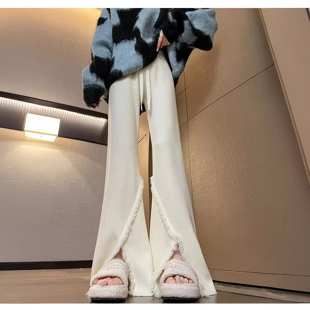 Damen Elegante Hose mit hohen Seitenschlitzen und fransigen Abschlüssen Drune