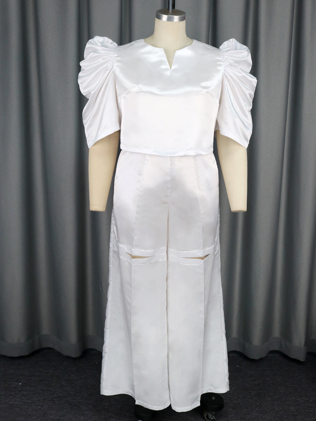 Damen Elegantes Jumpsuit mit voluminösen Puffärmeln und schickem Taillierungsdetail Drune