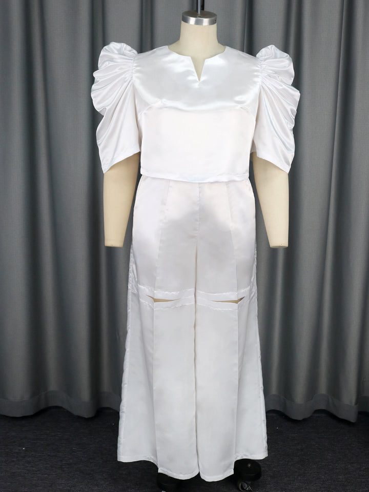 Damen Elegantes Jumpsuit mit voluminösen Puffärmeln und schickem Taillierungsdetail Drune