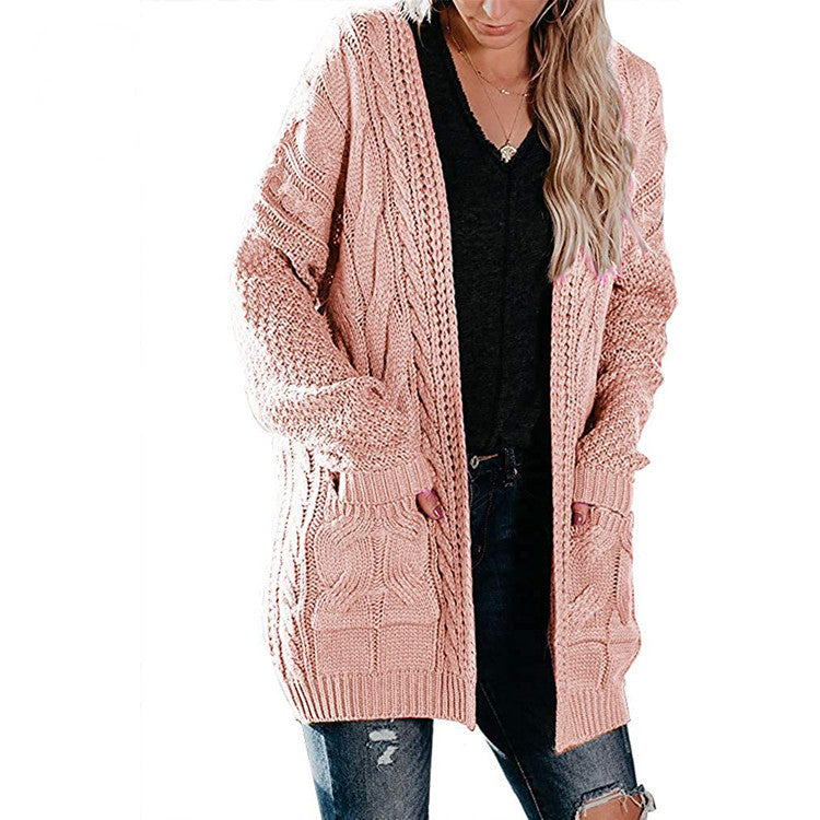 Damen Grobstrickjacke mit femininer Silhouette und praktischen Taschen Drune