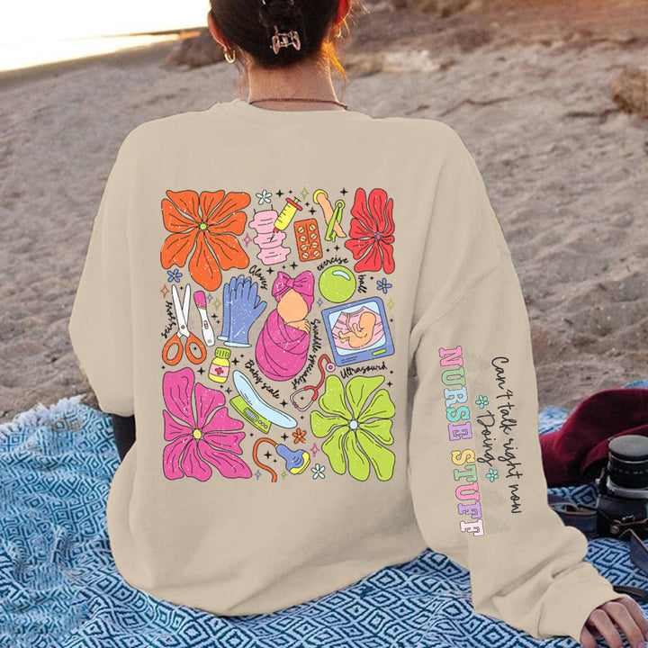 Damen Sweatshirt mit buntem Grafikdesign und originellem Pflege-Motiv Drune