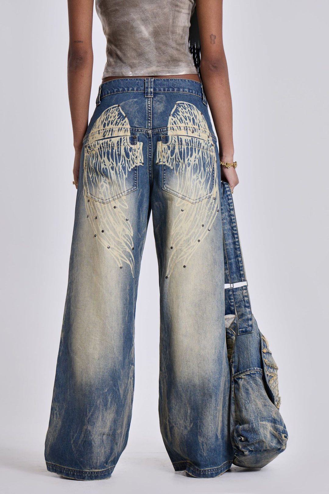 Damen weite Jeans mit kunstvollem Flügel-Design und einzigartigen Details Drune