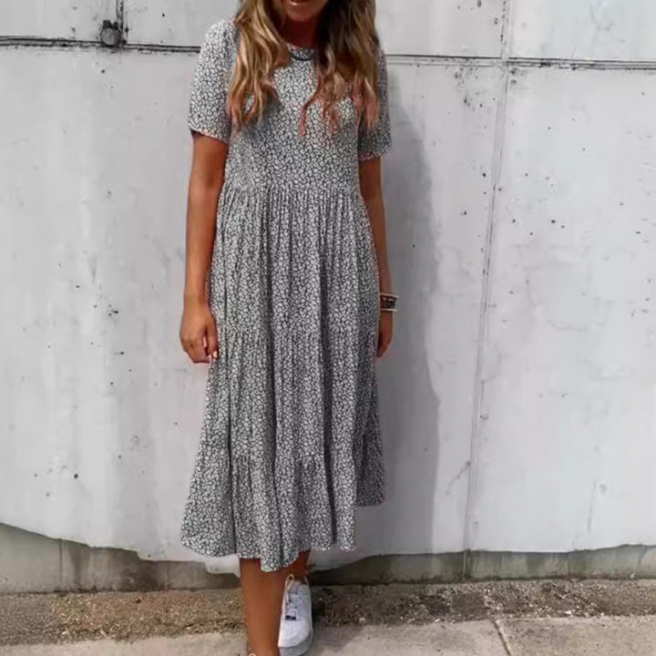 Damen nan geblümtes gekrepptes Midikleid mit geraffter Empire-Taille, kurzen Ärmeln und stufigem Volantrock Drune